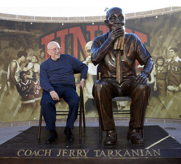 In 2013 a bronze statue of Tarkanian, showing the coach biting on the omnipresent game-day towel, was installed outside the Thomas & Mack. Underwritten by the UNLV Alumni Association and private donations through the One for Tark campaign.