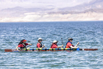 UNLV engineering students paddle concrete canoe at Lake Mead
