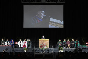 Commencement state with speaker on large screen