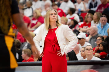 UNLV women's basketball coach Lindy La Rocque poses with her hands on her hips during a Lady Rebels game at Cox Pavilion