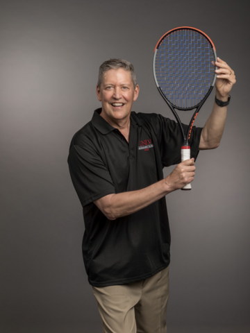 Michael Sullivan holding a racket