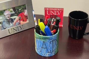 holder with pencils and markers that says dad