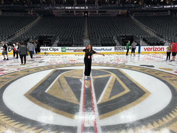 female on Golden Knights ice rink