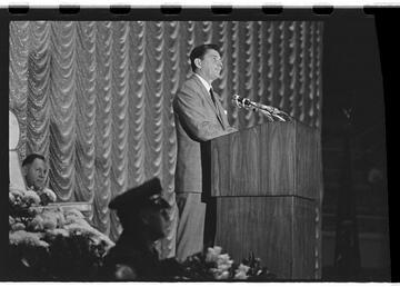 Ronald Reagan speaks at podium