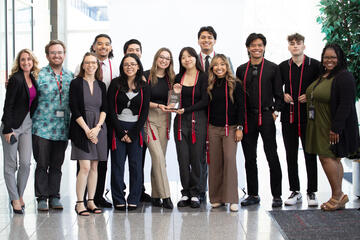 James Sarmiento with a group of peer mentors
