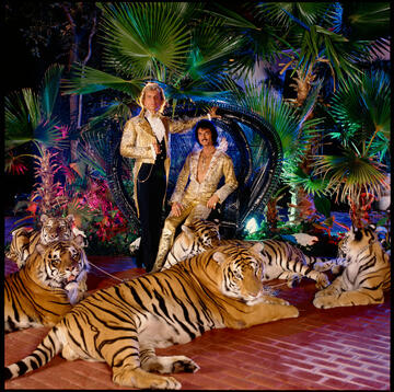 Siegfried and Roy with tigers