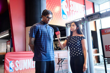 journalism student leads interview at NBA summer tournament at Thomas & Mack Center
