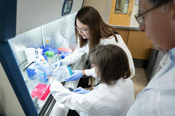 Amanda Leisgang Osse, PhD, in a brain health lab with school donors.