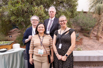 Roark (left) with her daughter-in-law and scholarship donor, Jenny Lee; scholarship recipient Baylee Colburn (right); and College of Sciences Dean Eric Chronister (back)