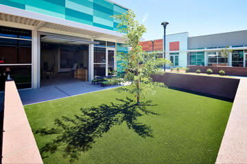 An outdoor courtyard area outside a preschool classroom.