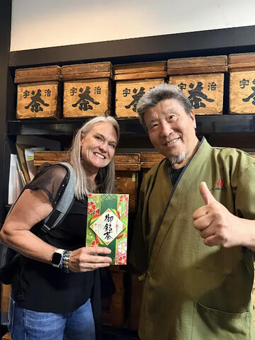 UNLV faculty with Japanese shop owner