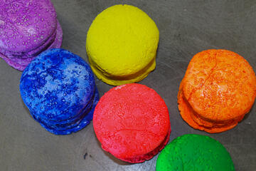 six colorful macarons