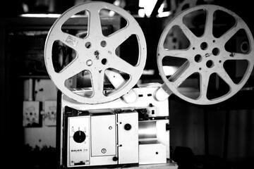 black-and-white archival photo of film projector