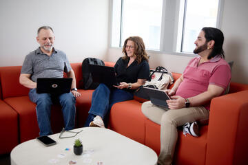 Billy Owensby, Lisa Dirk, Ryan Sousa sit together during study group