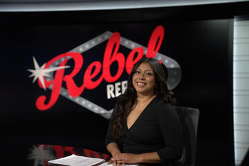 female journalism student ready to broadcast for The Rebel Report
