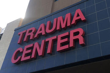 Red Trauma Center signage outside of U-M-C Hospital.