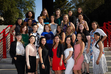 NEW Leadership cohort posing for group image on stairway