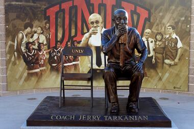 Bronze statue of Jerry Taranian sitting on chair