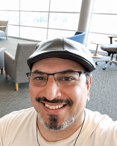photo of Alex in a hat