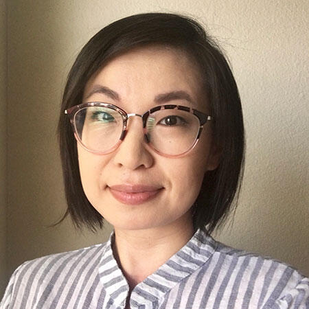 A woman with glassses.