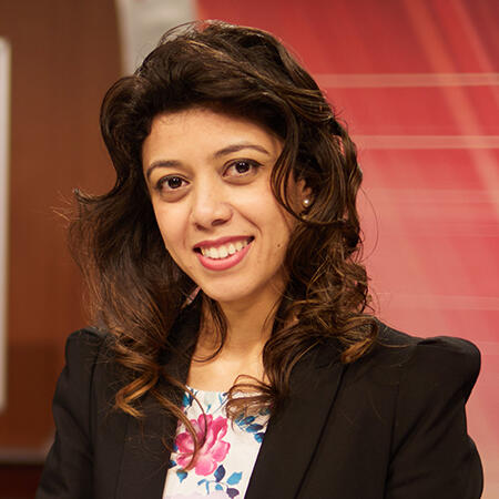 image of woman with a floral shirt