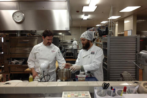 Chefs fixing a gourmet meal