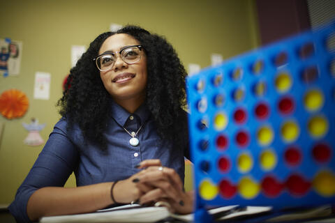 Allison Slaughter seated at a desk.