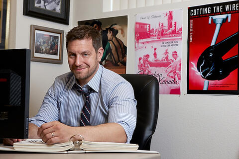 David Schwartz sitting at his desk