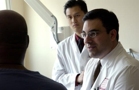 doctor speaking a patient