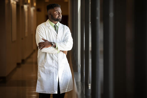 man in white lab coat