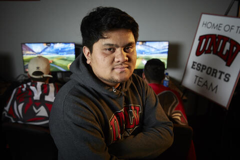 man in front of gaming screen