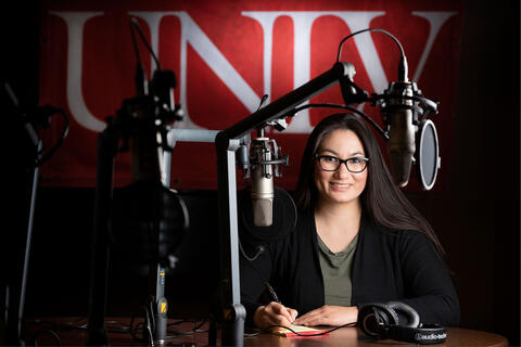 woman in audio recording booth