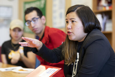 Erica Mosca seated at a table
