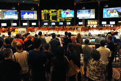 crowd watching screens