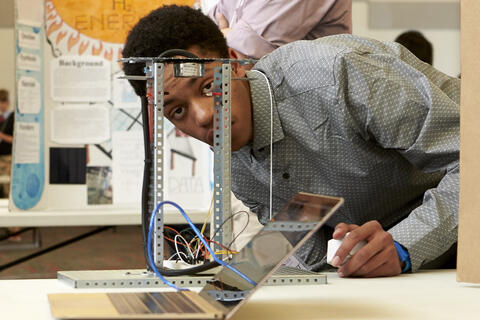 A high school student explores a project