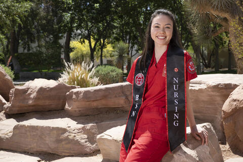 woman in red nursing scrubs