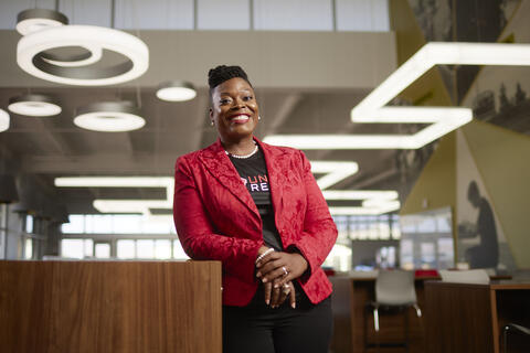 woman posing in library