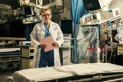 surgeon in trauma bay