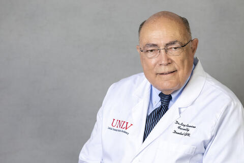 man in dental doctor coat