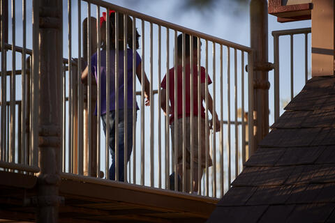 Children play on a playground.