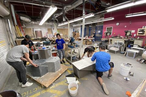 Students work hands-on with design project.