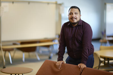 man in group study room