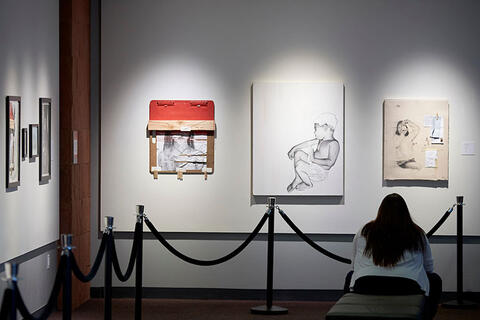 Person viewing an art exhibit