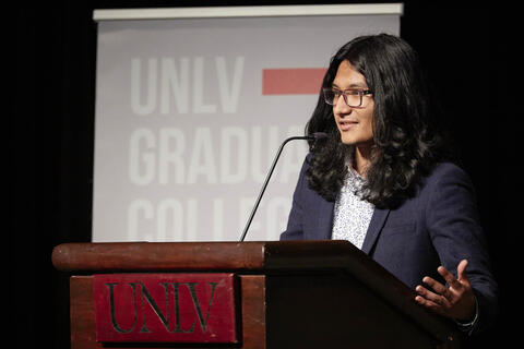 student speaking at podium