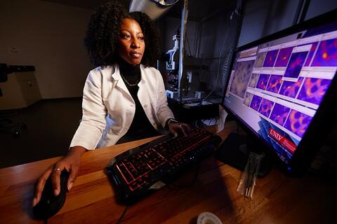 Person looking at medical scans on computer screen