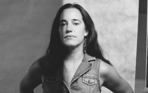 black and white photo of woman in denim top