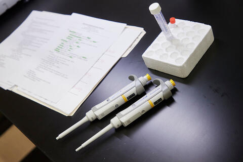 medical equipment next to open notebook