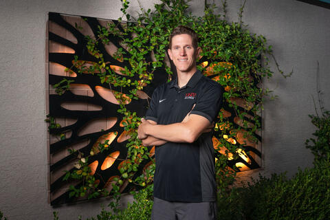 man with folded arms