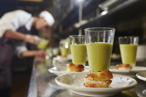 close up of colorful plated food in a kitchen