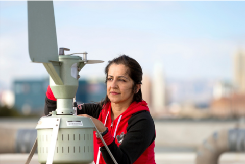 person using a device outdoors